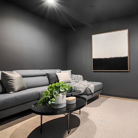 Curl up for a movie night in the home theatre