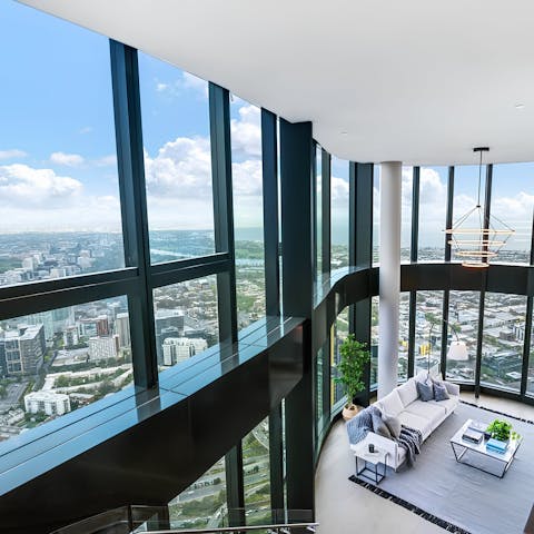 Admire panoramic views of Melbourne through floor-to-ceiling windows