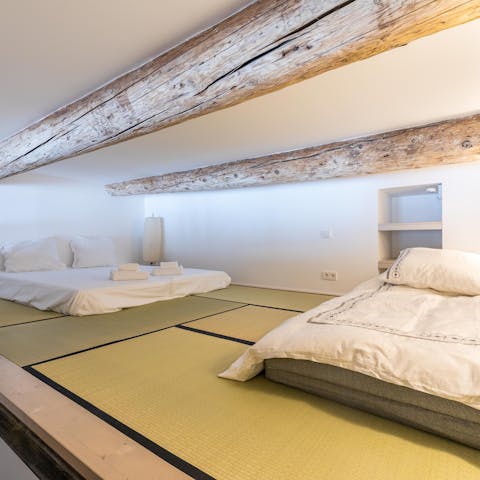 Experience the magic of mezzanine level – sleep beneath the beautiful beamed ceiling