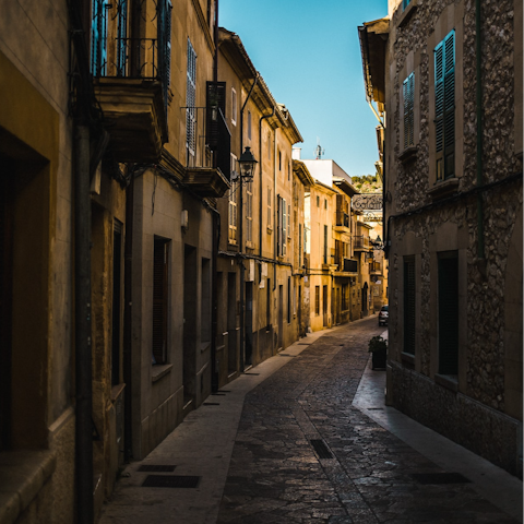Explore the shops, churches and markets of pretty Pollença