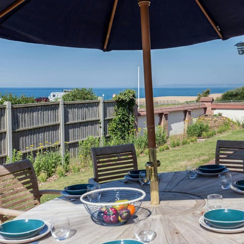 Dine alfresco while gazing out to Lyme Bay