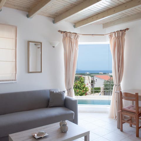 Admire the glittering sea views from the big windows in the living area