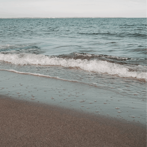 Wander down to Stalos Beach – a fifteen-minute walk – and sprawl out on the sand