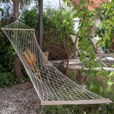 Swing on the hammock and take a snooze in the shade of the trees