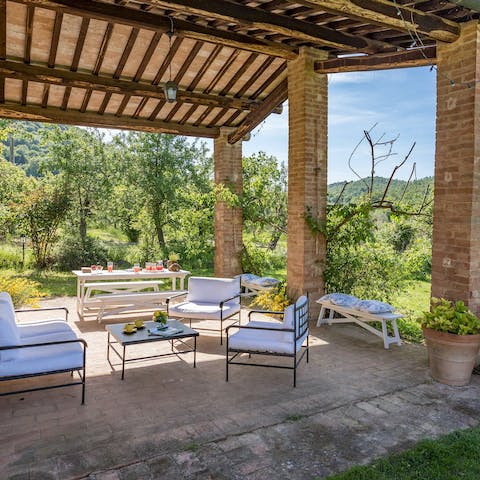 Find the perfect spot for drinks as the sun sets over the hills