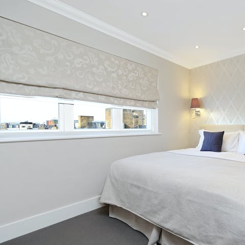 Take in rooftop views of Kensington with your morning coffee in bed
