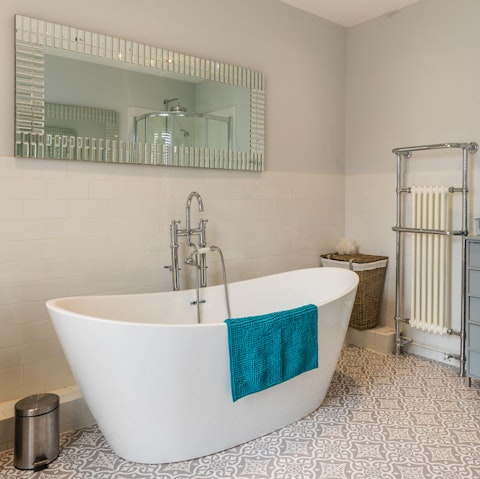 Sink into the free-standing bathtub for a long, luxurious soak