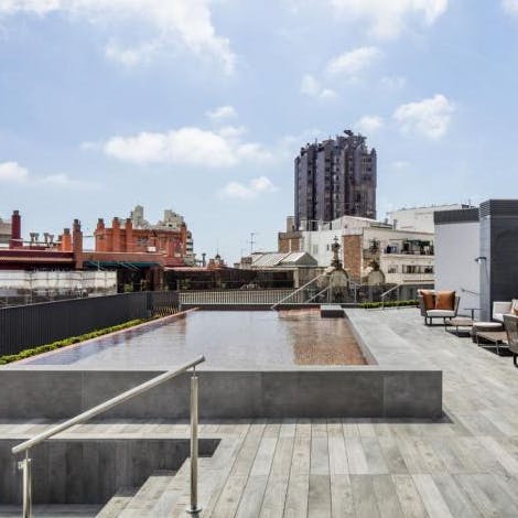 Head up to the communal roof terrace for a dip in the pool