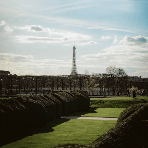 Stroll through Jardin des Tuileries admiring the iconic view