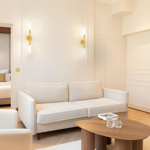 Return from the nearby Louvre to unwind before dinner