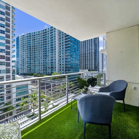 Enjoy a cup of coffee out on the balcony, breathing in the fresh air