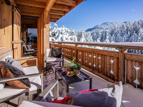 Sip hot chocolate as you drink in the views on the balcony