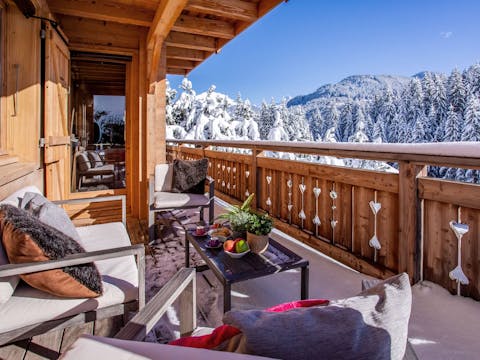 Sip hot chocolate as you drink in the views on the balcony