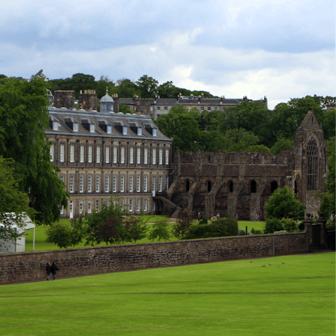 Visit the Palace of Holyroodhouse, a five-minute stroll away