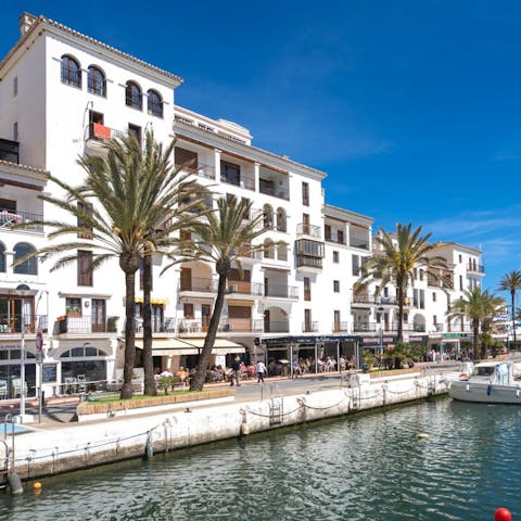 Stroll around the marina before heading to Colonia Beach