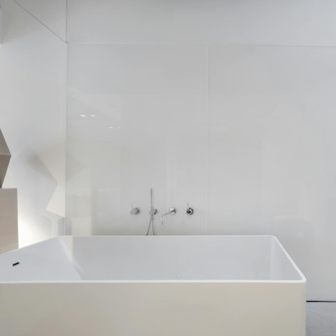Unwind in the bathtub after a day of exploring