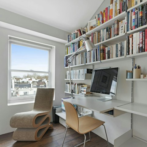 Catch up on work in the bedroom workspace