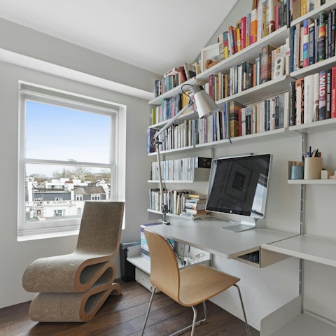 Catch up on work in the bedroom workspace