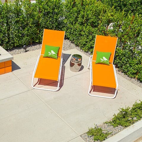 Soak up the sun on your private patio before lighting up the firepit in the evenings