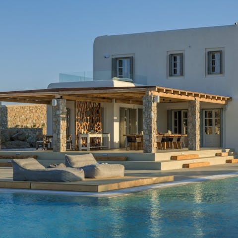 Immerse yourself in the cooling waters of your beach-entry-style swimming pool