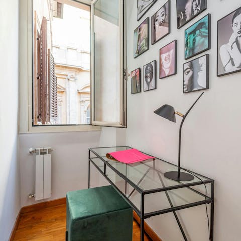 Set up for a day of remote working at the small desk