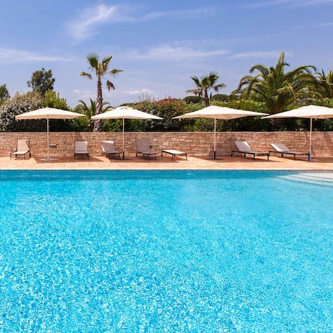 Make lounging beside the shared pool the only firm plan for the day