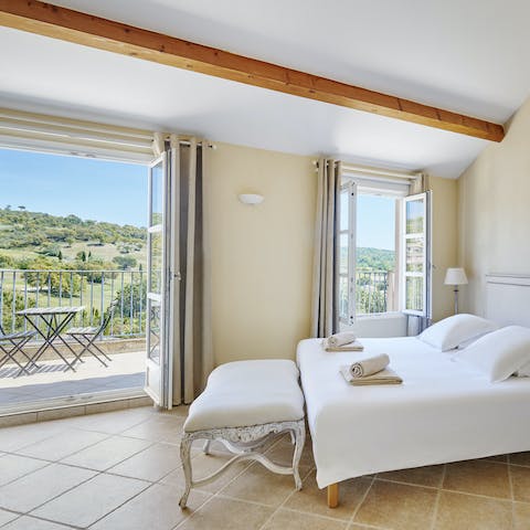 Soak up the green vistas from the top-floor main bedroom with en-suite