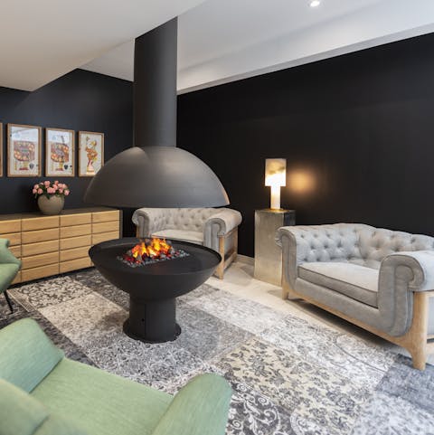 Gather around the fire pit with other residents in the lounge