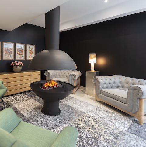 Gather around the fire pit with other residents in the lounge