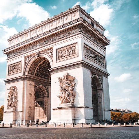 Stroll six minutes to the visit the grand Arc de Triomphe