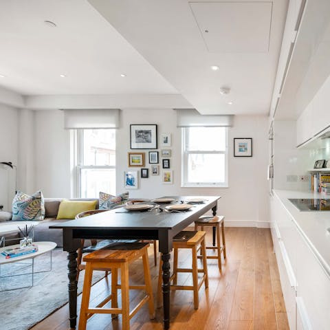 Sit down to a celebratory meal in the bright kitchen
