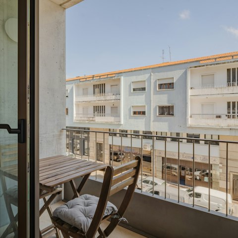 Sip a celebratory sundowner on the private balcony