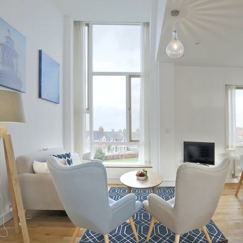 Bathe in the natural light from the floor-to-ceiling windows