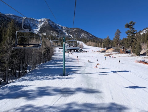 Carve fresh powder at Diamond Peak with panoramic Lake Tahoe views, a seven-minute drive