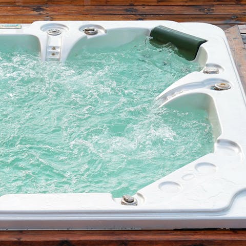 Bubble your troubles away in the private hot tub, watching the sunset