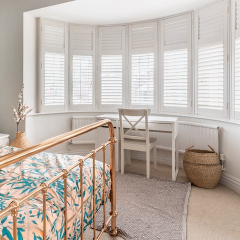 Get some work done at the desk in the bay window