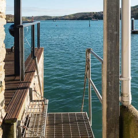 Descend the steps off your terrace to your private jetty