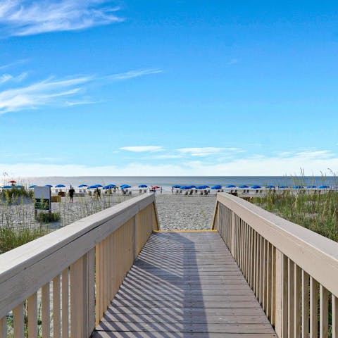 Walk down the private path to the beach, three minutes away