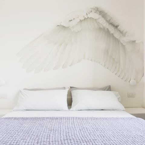 Sleep under the angel's wing in the bedroom
