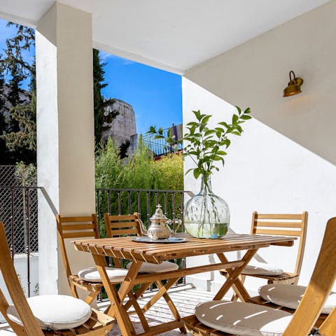 Gather on the terrace to share sunset drinks and tapas