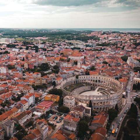 Visit nearby Pula to discover the Roman ruins