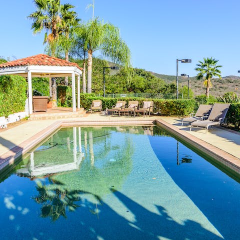 Spend lazy days by the pool