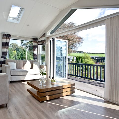 Slide open the bi-fold doors to let the sunshine in
