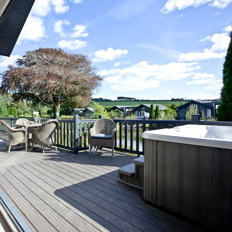 Make sundowners in the hot tub part of your new evening routine