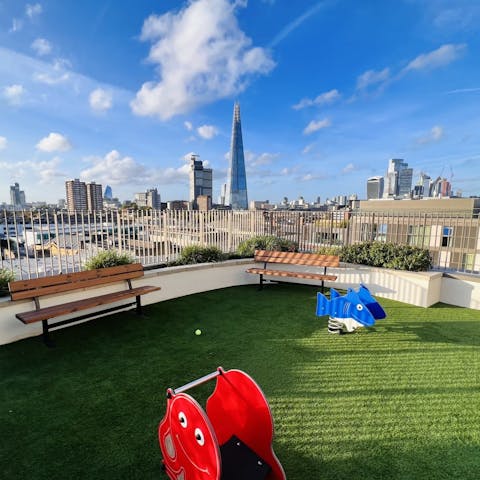Head up to the rooftop terrace for a children's play area with a cityscape backdrop