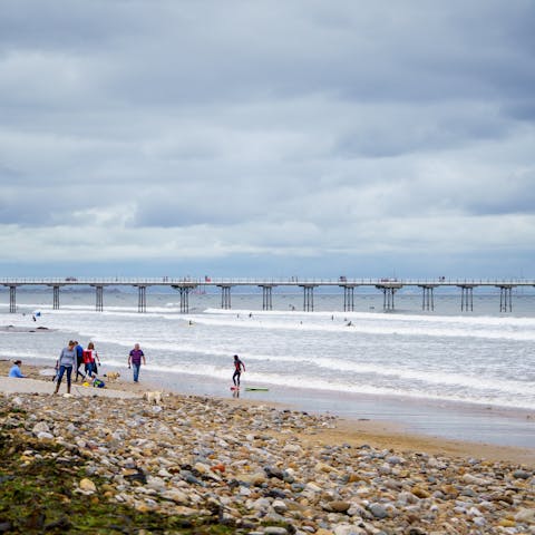 Go for a stroll on Saltburn Beach, a two-minute walk away