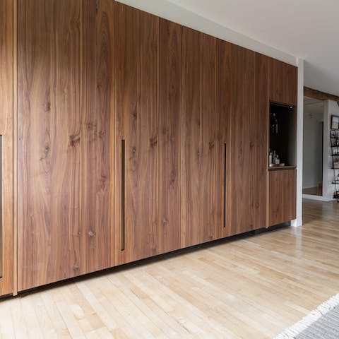 Conceal the kitchen away if you don't fancy tidying up straight away after dinner