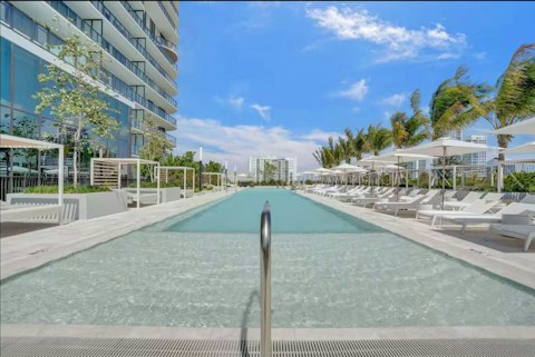 Enjoy the perks of the communal pool under expansive Miami skies