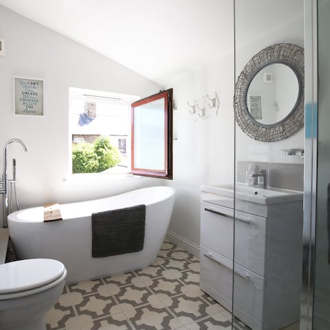 Pour yourself some bubbles and ease into a bubble bath in the tub
