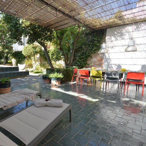 Enjoy an afternoon aperitivo in the outdoor living area